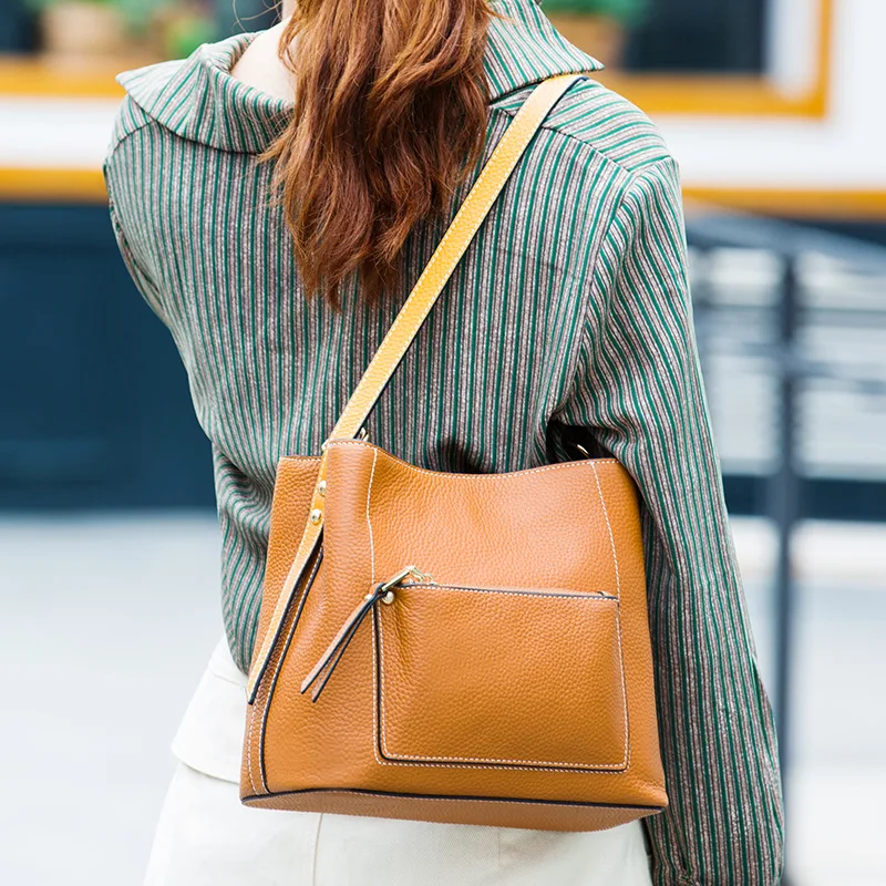 Women's new European and American fashion leather large-capacity handbag Vertical square leather Litchi zipper shoulder Messenge