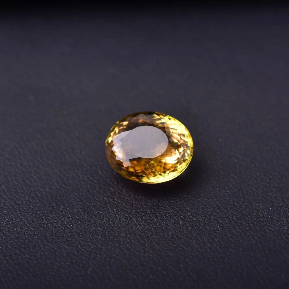 

7.04ct tourmaline yellow gemstones .The wish stone of power and status. Specifications: 12.6mm * 10.5mm * 7.1mm