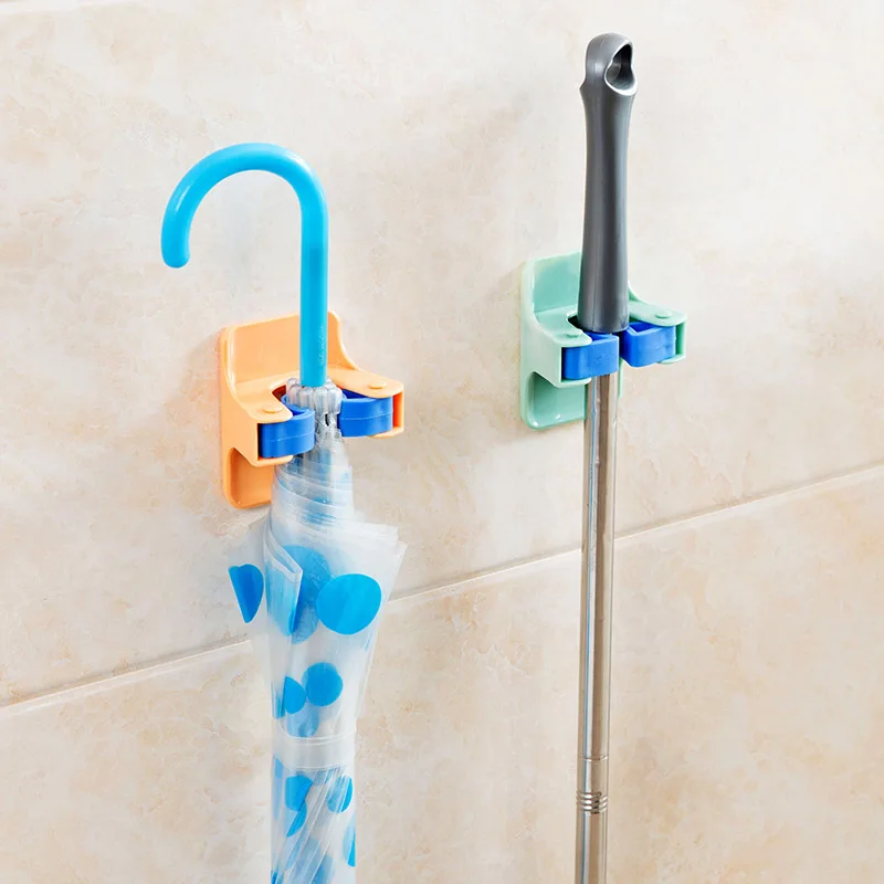 Strong-Adhesive-Mop-Towel-Bathroom-Free-Punch-Sweep-Porter-Bathroom-Suction-Wall-Mop-Clip-Holder (1)