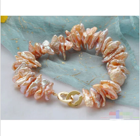 

Free shipping >>>>>>P3828 New Style 8" DENS PINK BIWA FRESHWATER PEARL BRACELET