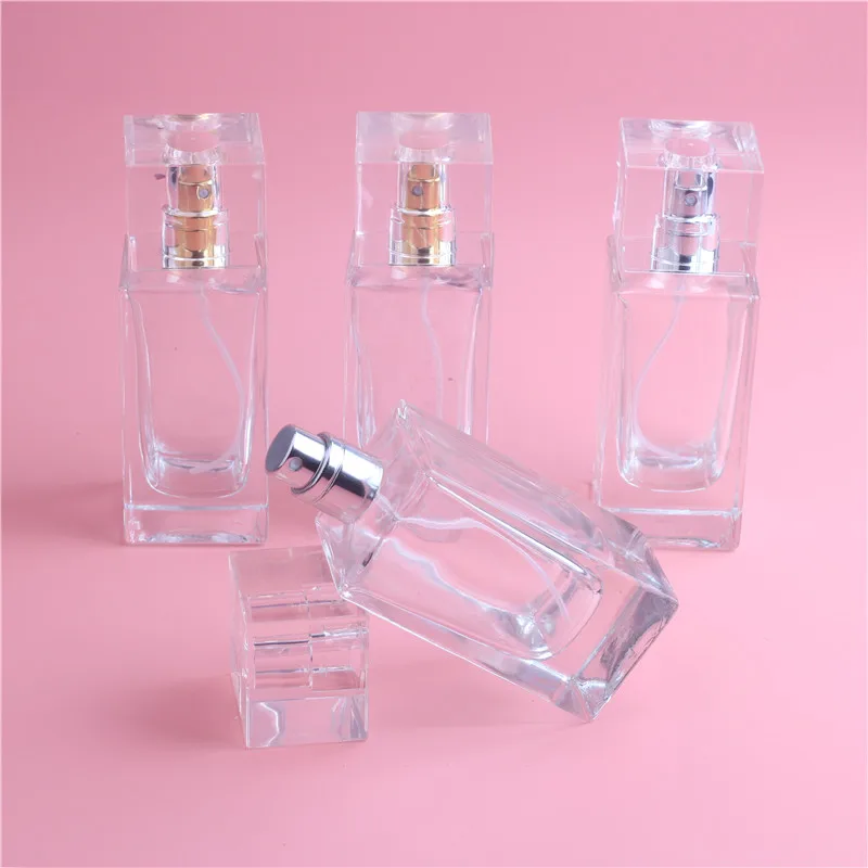 Nová 50ml parfémová láhev Skleněná naplnitelná parfémová láhev s kovovým sprejem a prázdným obalem Parfémové lahvičky s rozprašovačem