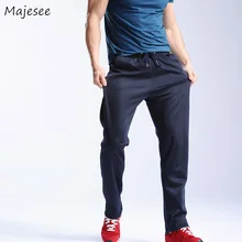 Брюки для бега Для мужчин одноцветное свободные эластичный пояс Повседневное Для мужчин s брюки Карманы эластичный Мода брюки корейский стиль новые мягкие повседневные Модные