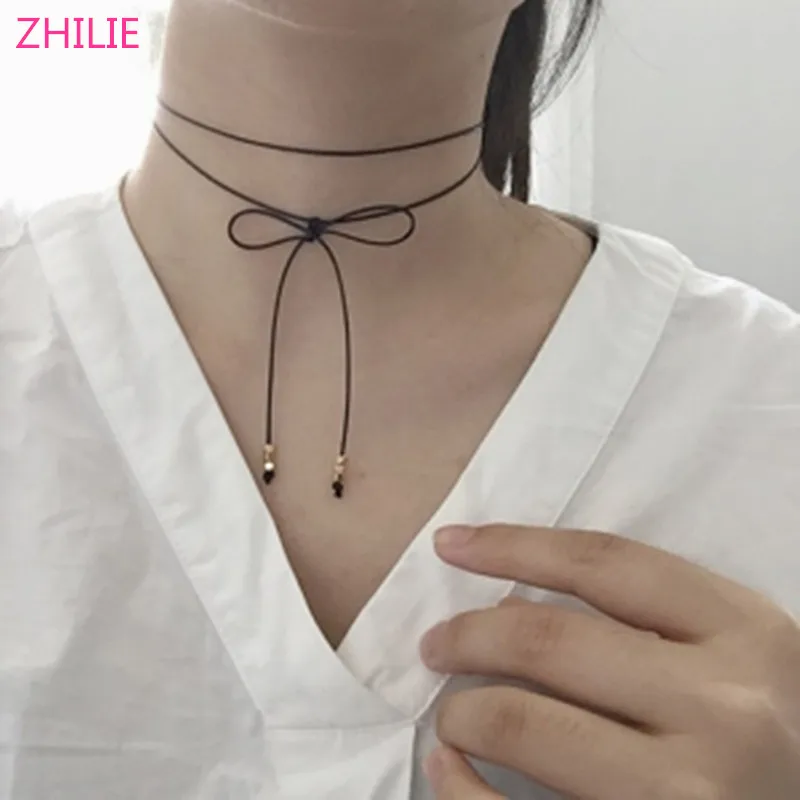 

2017 new Korean version of the simple simple and elegant double bowknot metal ball short necklace chain