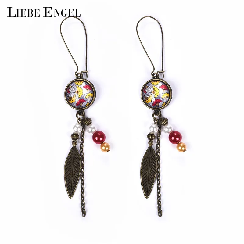 

LIEBE ENGEL Bohemia Style Creative Leaf Pendant Charm Leaf Print Cabochon Earrings Red Bead Pendant Earrings Jewelry Women Gift