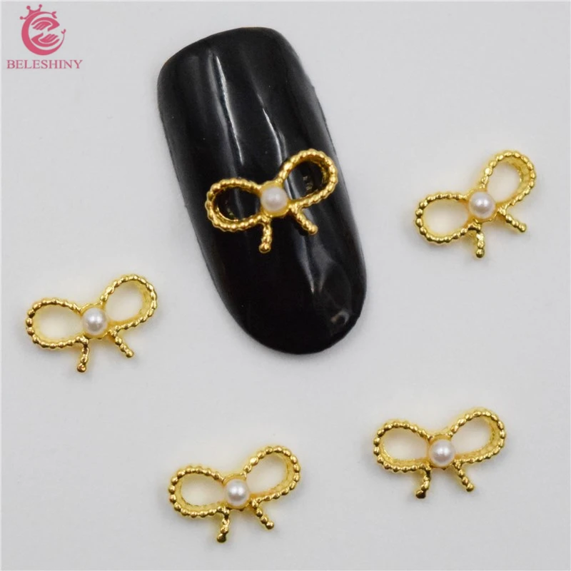 

50Pcs new Gold Bow nail stickers, 3D Metal Alloy Nail Art Decoration/Charms/Studs,Nails 3d Jewelry nail supplies BY038