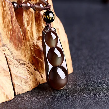 

A natural ice Rainbow Obsidian Pendant Sauteed Green Beans male and female Cai Bao Ping Ping jewelry transport Made in China