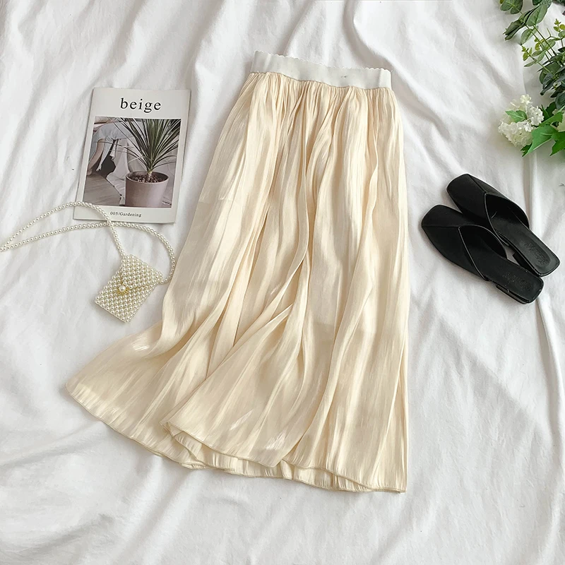 

2019 new fashion women's skirts Spun silk elastic waist and long sections put on a large half-length skirt summer