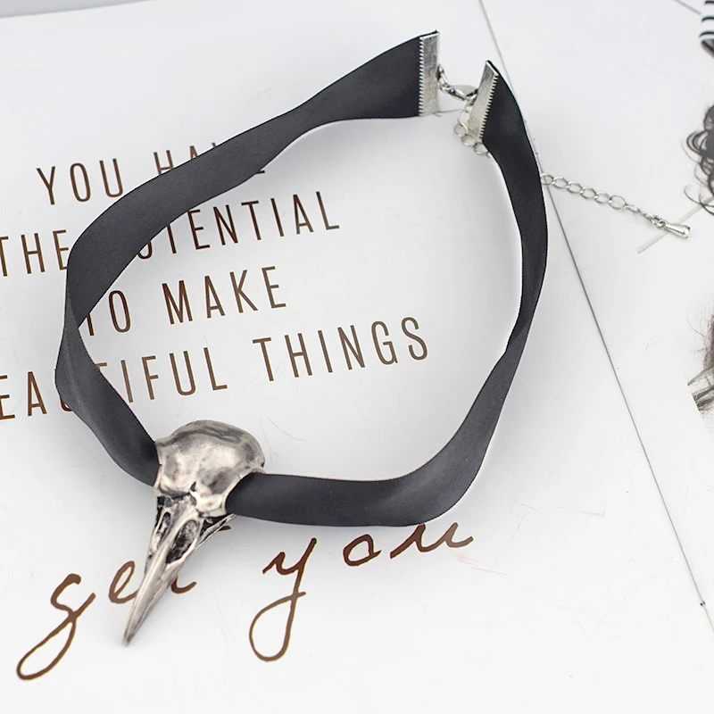 skull bird necklace