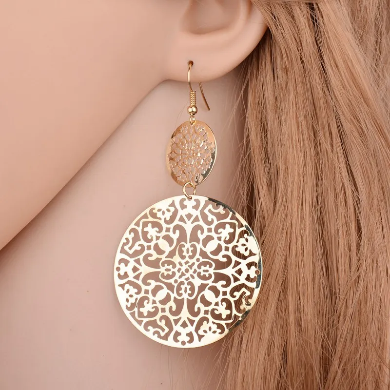 

European and American fashion big-name fashion earrings fashion vintage hollow disc grinding earrings long ear nail
