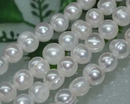 

Natural white 5strs A++ 11mm luster screw thread freshwater pearls