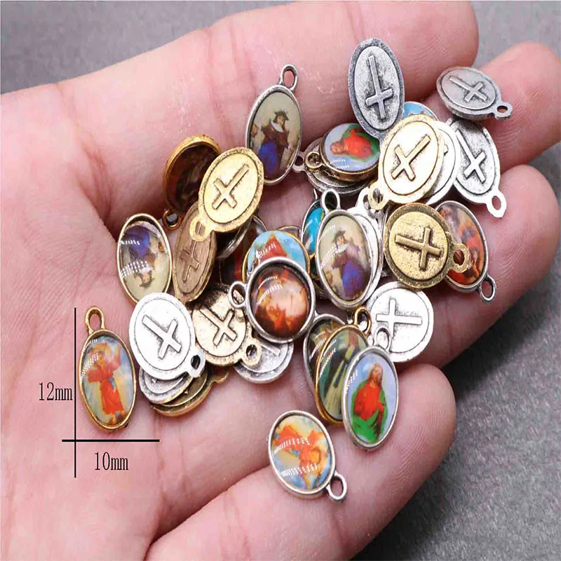 

100 pieces of religious icons vintage silver medals various Jesus icons handmade medals day charm handmade jewelry DIY accessori