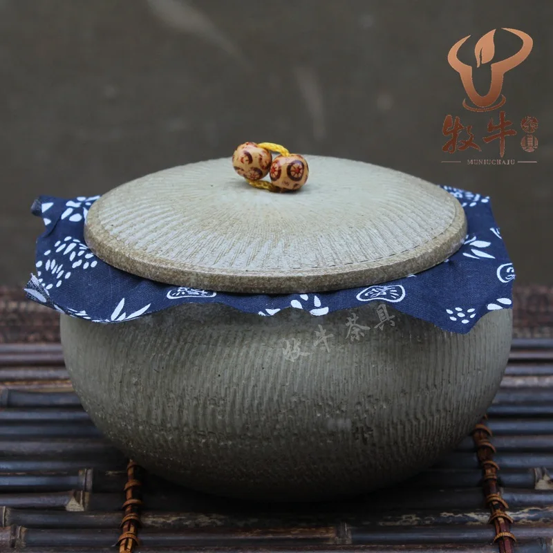 The new Yixing Yixing tea mix round belly bright glaze small pot tea storage tank manufacturer direct price