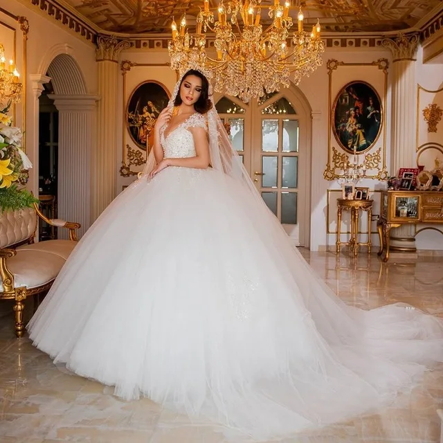 

Luxury Princess Wedding Dresses 2017 Sleeveless Sheeer Neck Applique Beaded Ball Gowns with Chapel Train for Bride robe de noiva