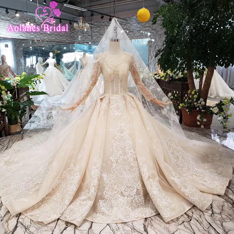 

Sexy Full Beads Crystals Wedding Dresses High-end Lace See Though Long Sleeves Lace Up Back Wedding Gown 2019 New Bridal Dresses
