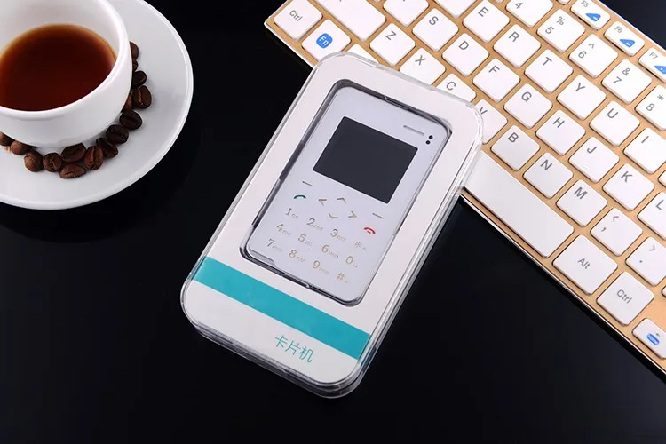 AEKU V5 мобильный телефон с картой 6,9 мм ультра тонкий карманный мини-телефон 1," экран четырехдиапазонный Многоязычная английская сенсорная клавиатура