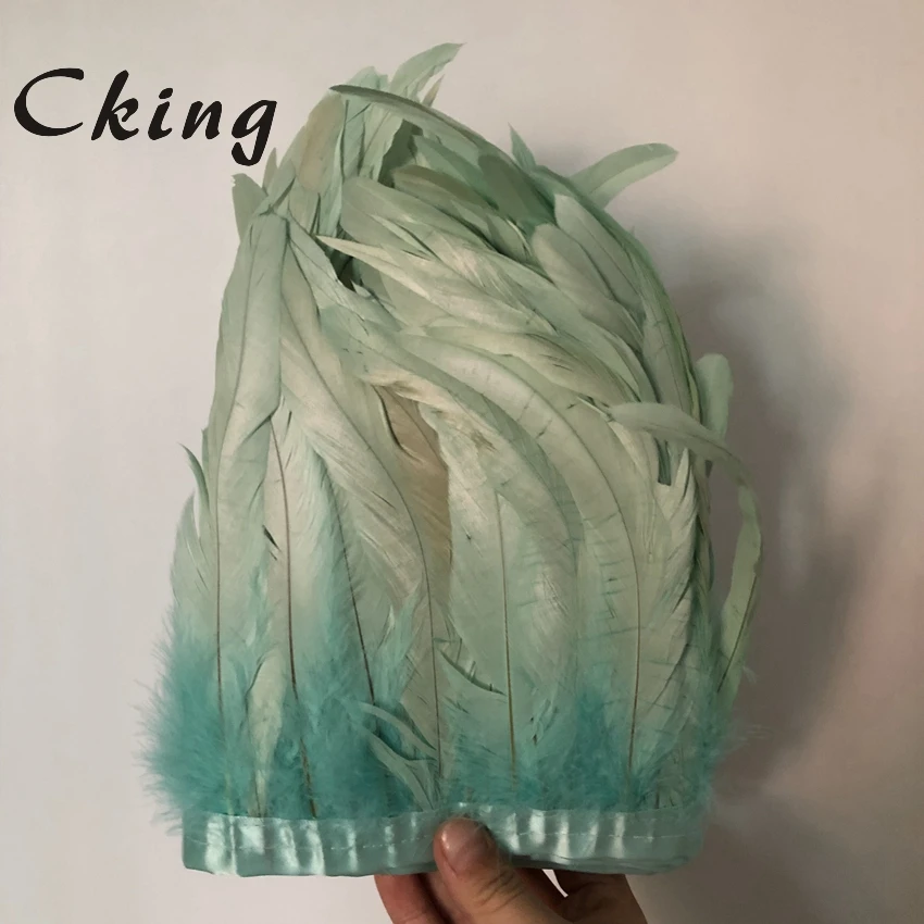 

Cking 2 Meters 6-8 inch Width Mint Green Rooster Tail Feather Trim Coque Feather Trimming For Crafts Dress Skirt Costumes Plumes