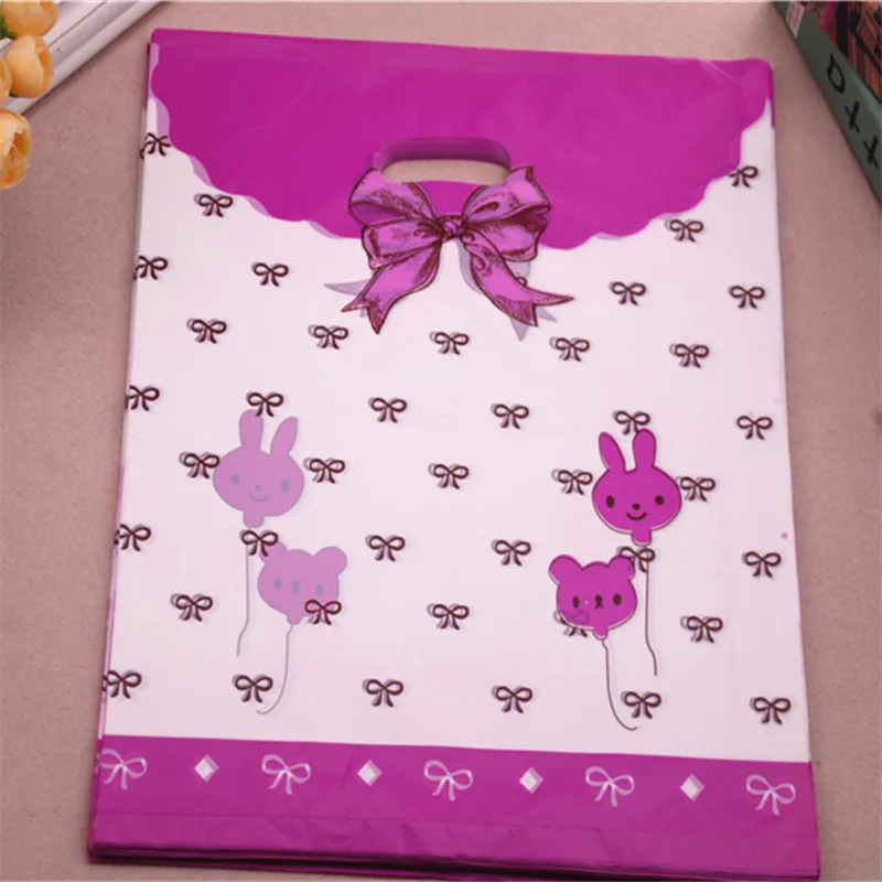 

50pcs/lot 35*45cm Lovely Wedding Gift Packaging Bags With Bow Plastic Large Gift Packing
