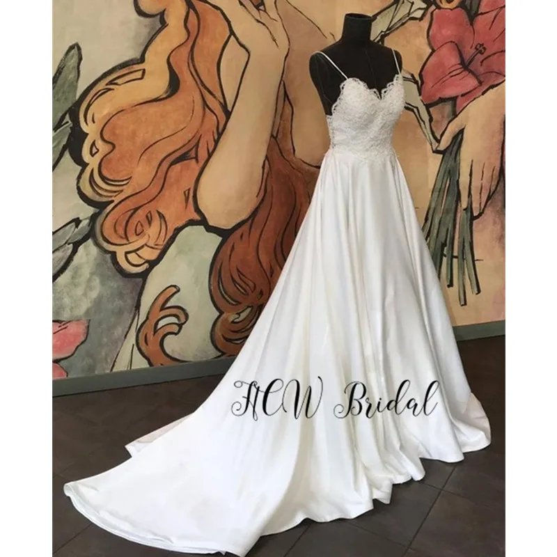 

Simple Wedding Dresses 2019 Lace Top Backless A Line Spaghetti Strap Sexy Bridal Gowns Custom Made Vestido De Casamento Cheap