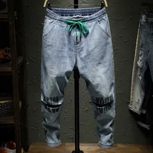 Корейская мода, рваные джинсы с дырками на коленях, Мужские штаны-шаровары в стиле хип-хоп, уличная одежда, синие брюки с эластичной резинкой на талии, мужская одежда