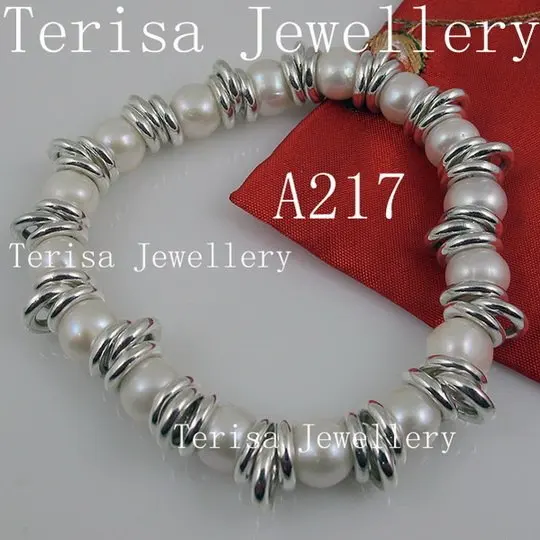 

New Free Shipping A217#, Grade AAA.Natural Fresh Water Pearl Barcelet.Size:8-9mm.Made with silver Elastic Bracelet.