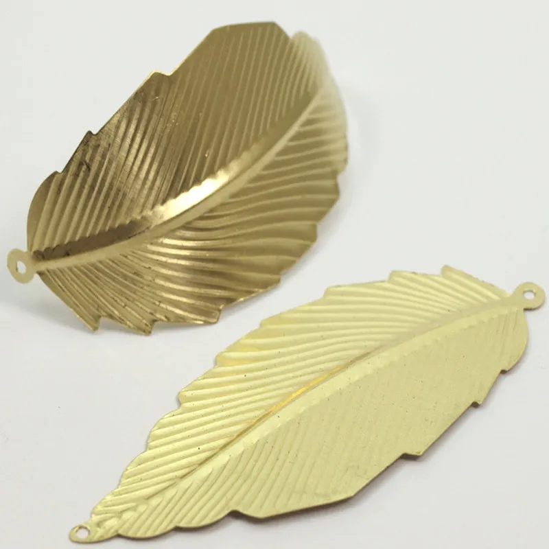 

. .. 6pc, Raw Brass plant Leaf Pendant ( 2 Holes)..sz (75x31mm) D065