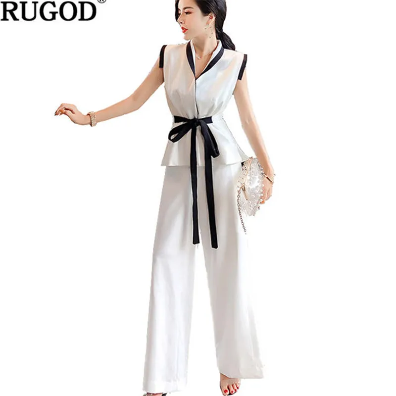 white sleeveless pant suit