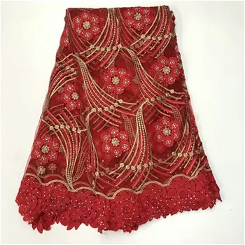 

Popular Latest High quality African Milk silk Guipure Cord Lace With Stones fabric In gold Red For Nigerian Christmas Dress