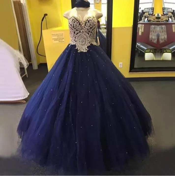 navy blue and gold quinceanera dress
