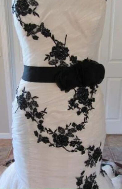 white dress with black roses