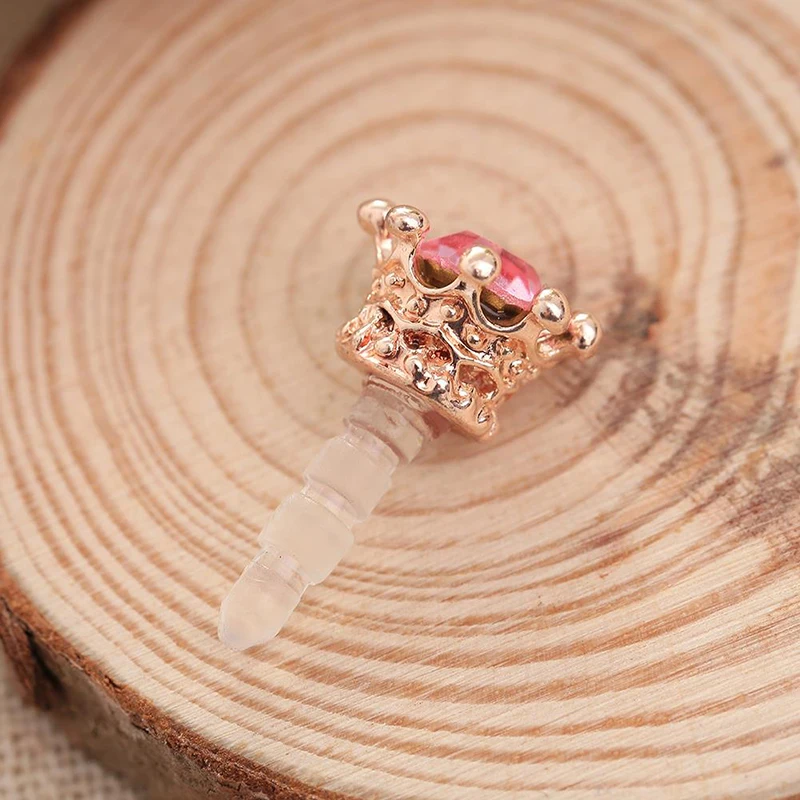HTB1KHQEQSzqK1RjSZFpq6ykSXXad image HTB1KHQEQSzqK1RjSZFpq6ykSXXad Mobile Phone Dust Plug Rhinestones Crown Anti dust Plug Diamond Pendant Sweet Cell Phone Accessories Charge Port Plug For iphone