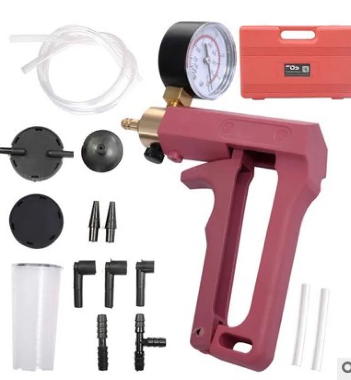 A car with a manual car vacuum pump vacuum pump vacuum suction gun