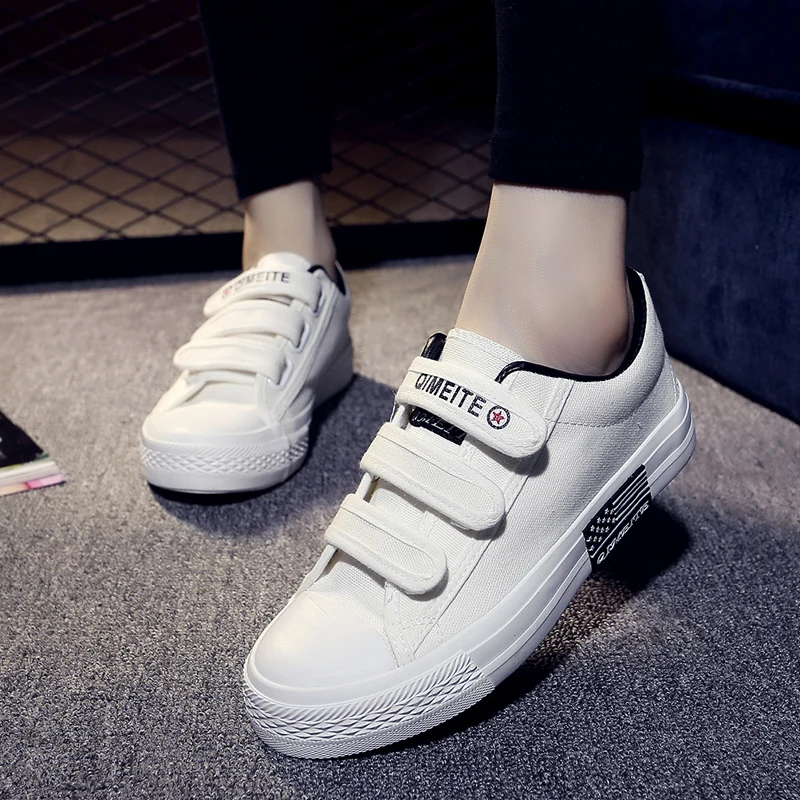 white canvas velcro shoes