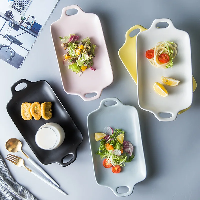 

European-style breakfast plate is placed on a plate with rectangular and round dishes