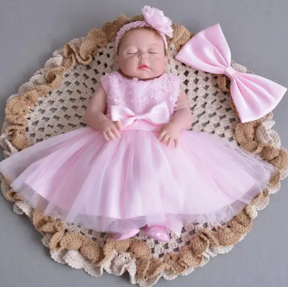 

Red vinyl skin 57CM Silicone Reborn Baby Doll bebe girs reborn Toy Realistic sleeping doll for sale Children gift Fast delivery