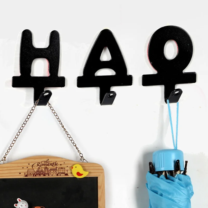 

1pc English Letters Shape Iron Wall Hook Adhesive Robe Hooks Hanger for Clothes Cap Key Holder Home Organizer