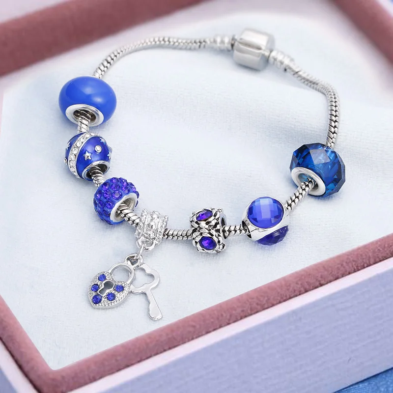 

Charms Silver Snake Chain Brand Bracelets For Women Jewelry Shiny Blue Crystal Lock Key Leaves Snowflake Pendant Flowers Beads