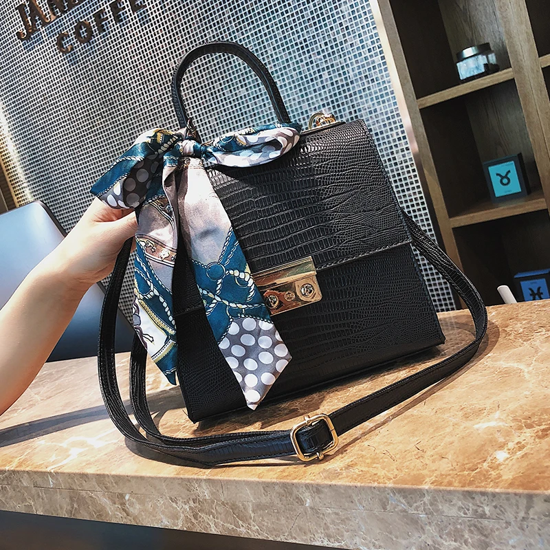 2018 جديد أزياء المرأة مصمم حقيبة يد القوس المحمولة صندوق مربع جودة بو الجلود المرأة حقيبة قفل المراهنات حقيبة الكتف كروسبودي