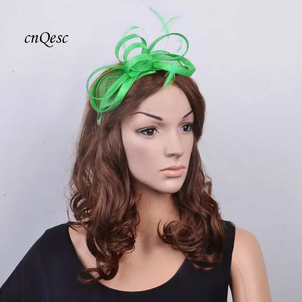 

Mint green small Sinamay Fascinator hat wedding hat.