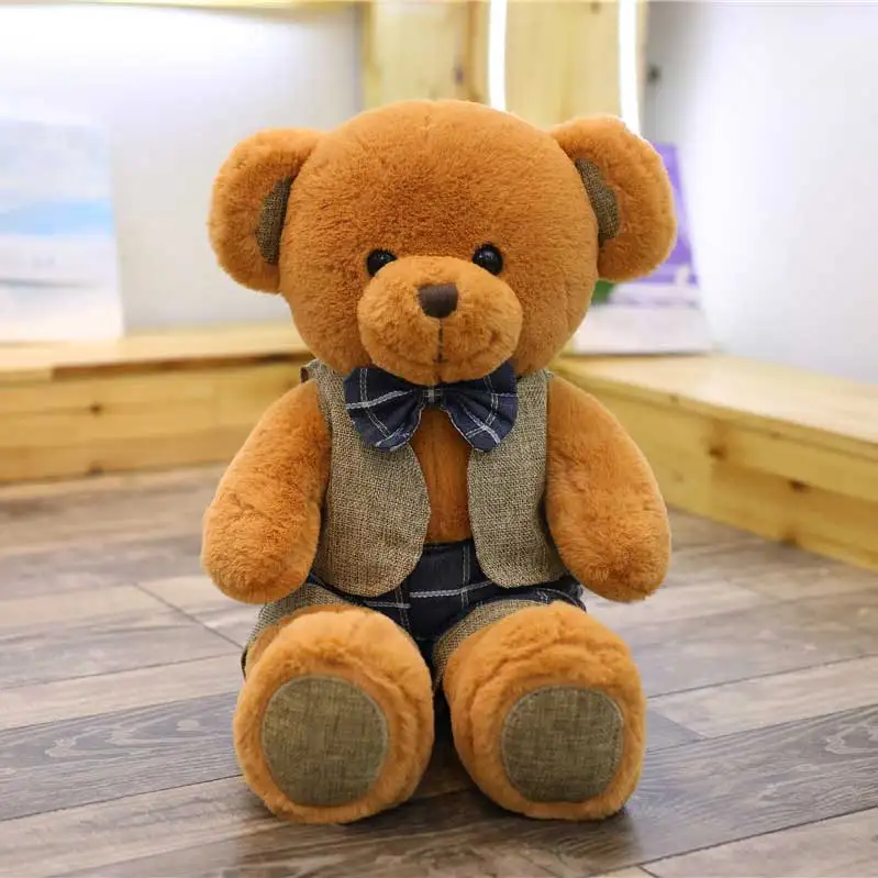 teddy bear wearing a suit