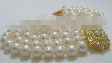 

free shipping 00948 3row round white freshwater pearl bracelet -golden zircon clasp