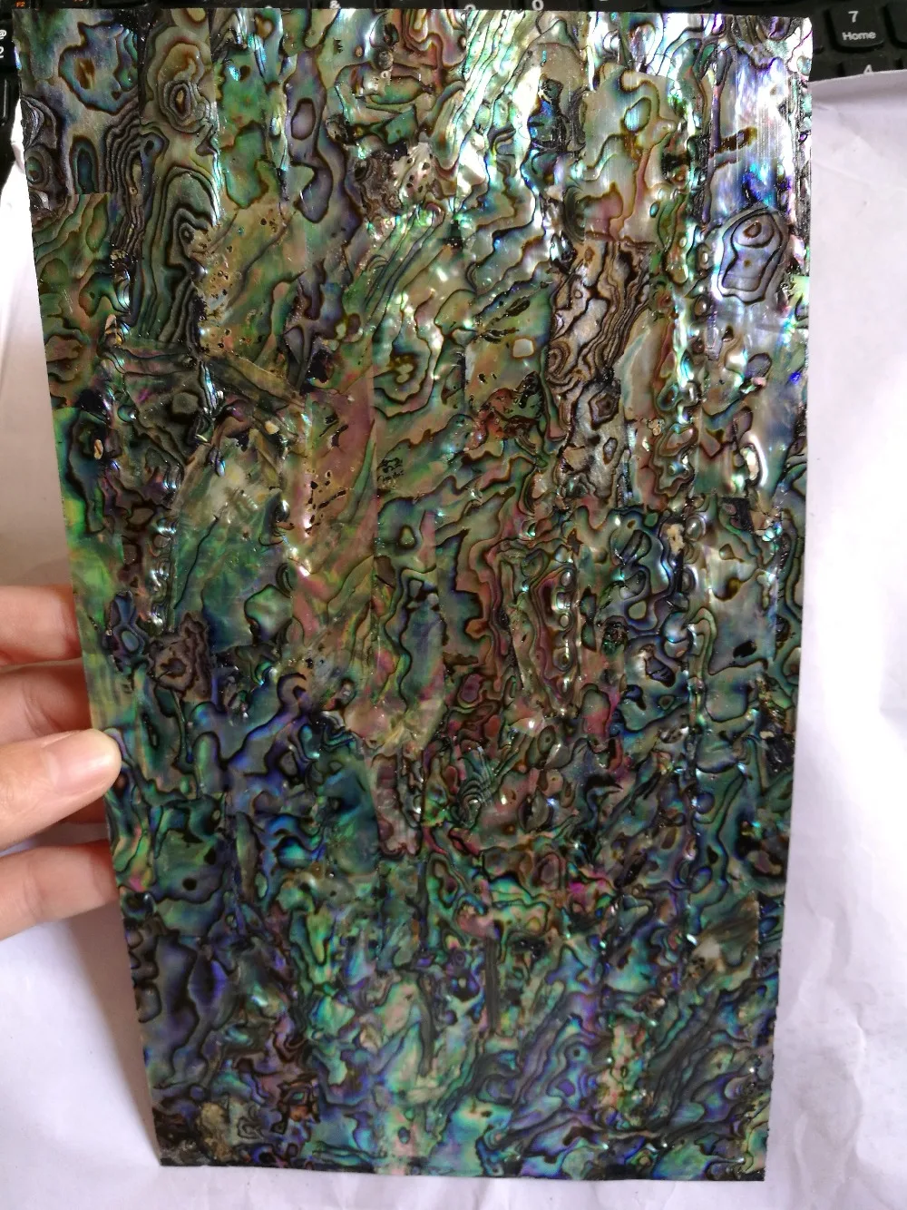 Natural mother of pearl shell laminate for musical instrument and