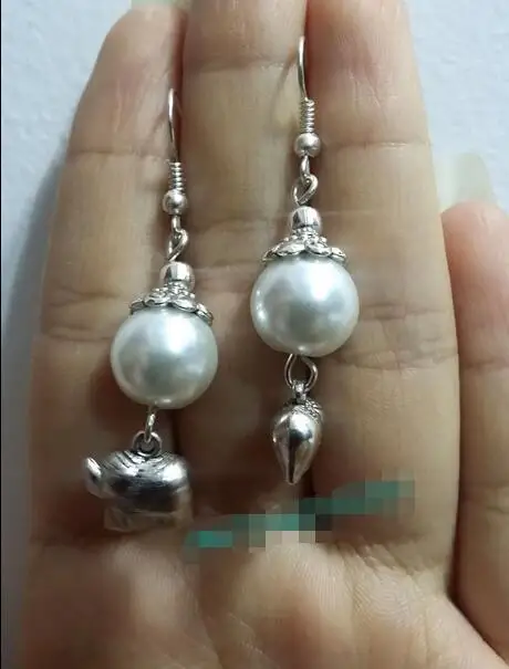 

Free Shipping >> Trendy New 12mm White shell pearls Tibet silver elephant Dangle earrings