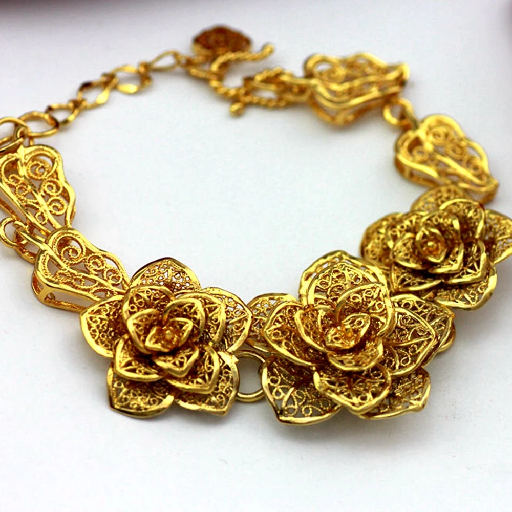 Gold floral bracelet Clearance