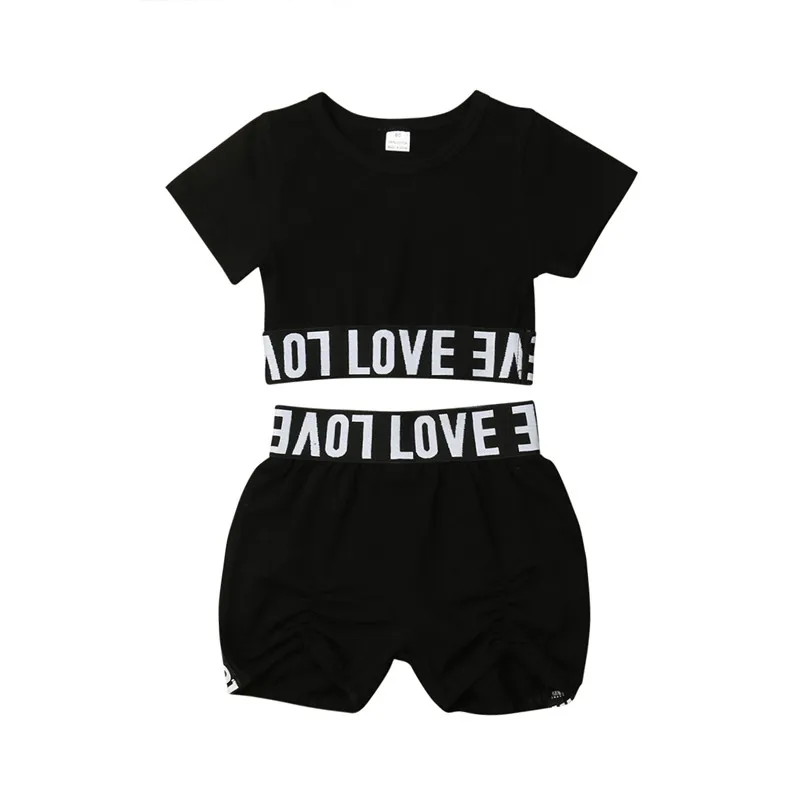 Новые детские комплекты одежды черного цвета для девочек короткий рукав; короткий топ с надписью; футболка и шорты; летняя повседневная одежда; пляжный костюм