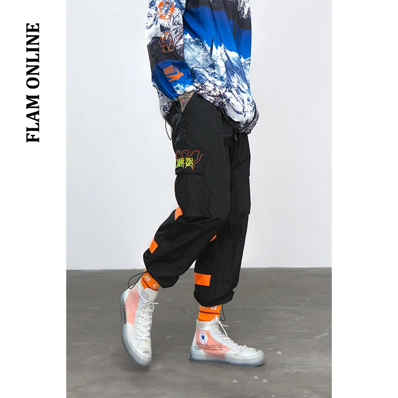 

FLAM ONLINE 2019 Brand Clothes Sweatpants Wind breaker Pants Night Street wear Sporting Fluorescent Loose Fit Trousers