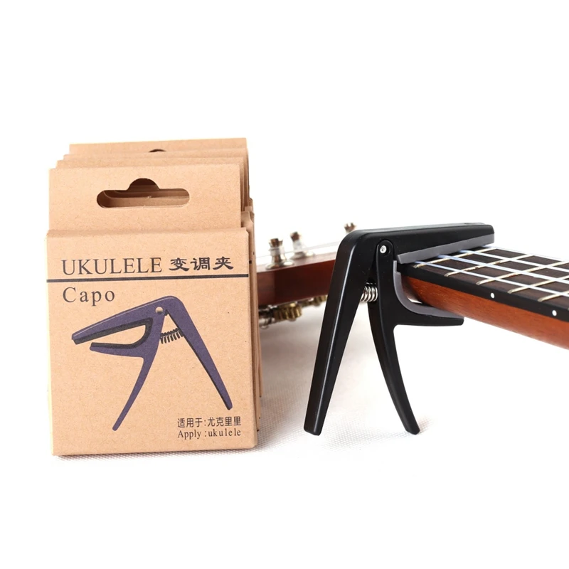 

Ukulele Capo Clamp Plastic Guitar Capo Single-handed Quick Change For Acoustic And Electric 4 String Guitars Ukulele Guitar Part