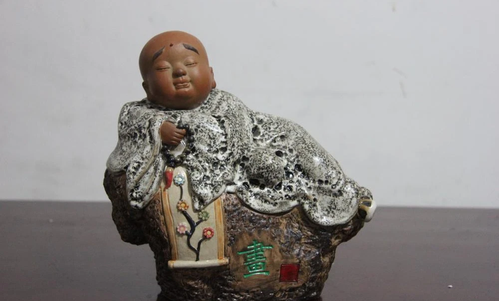 

China pottery porcelain Seat Buddhist Young Monk Shaveling Wooden Knocker Statue