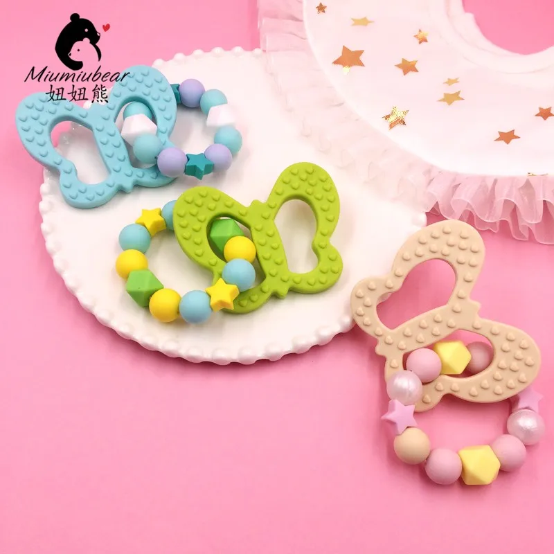 

Butterfly bracelet silicone teether baby toy easy to grab chewable safe food grade BPA free