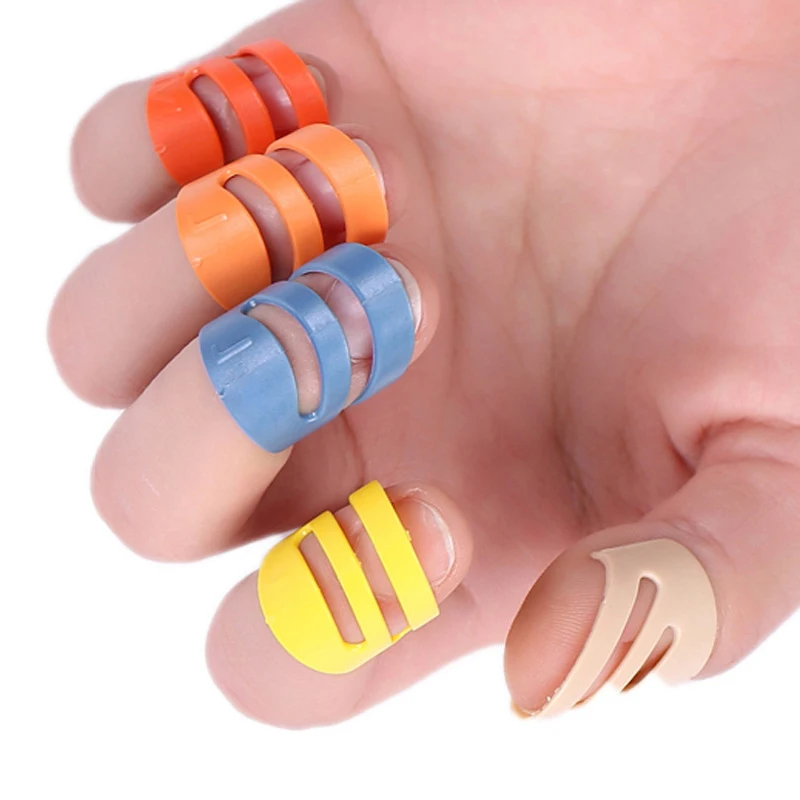 

The New Guitar High-quality Durable Painproof Versatile Plastic Finger stall Picks Tools 6 Colors