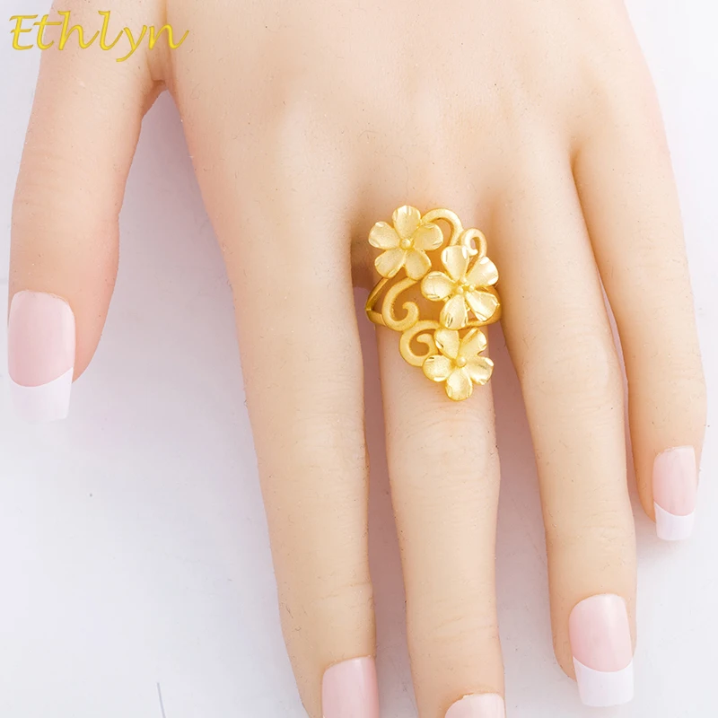 

Ethlyn Ethiopian Adjustable Flower Shape Gold Color Imitation Ring for Women Anniversary Made with Cooper Luxury Jewelry R65